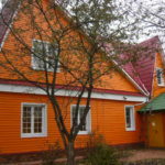 Как правильно оформить фасад оранжевыми панелями