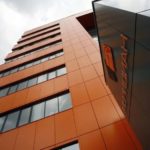 Современные фасадные панели оранжевого цвета